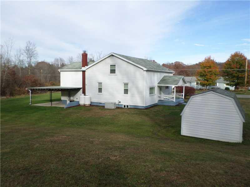582 Ceylon Road Carmichaels, PA 15320 - Photo 3 of 19 Exterior Back. 1 car attached garage, as well as a 1 car carport too