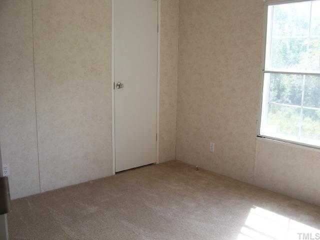 730 Creech Johnson Road Zebulon, NC 27597 - Photo 8 of 12 All 4 bedrooms are nice size and large windows. Bedroom