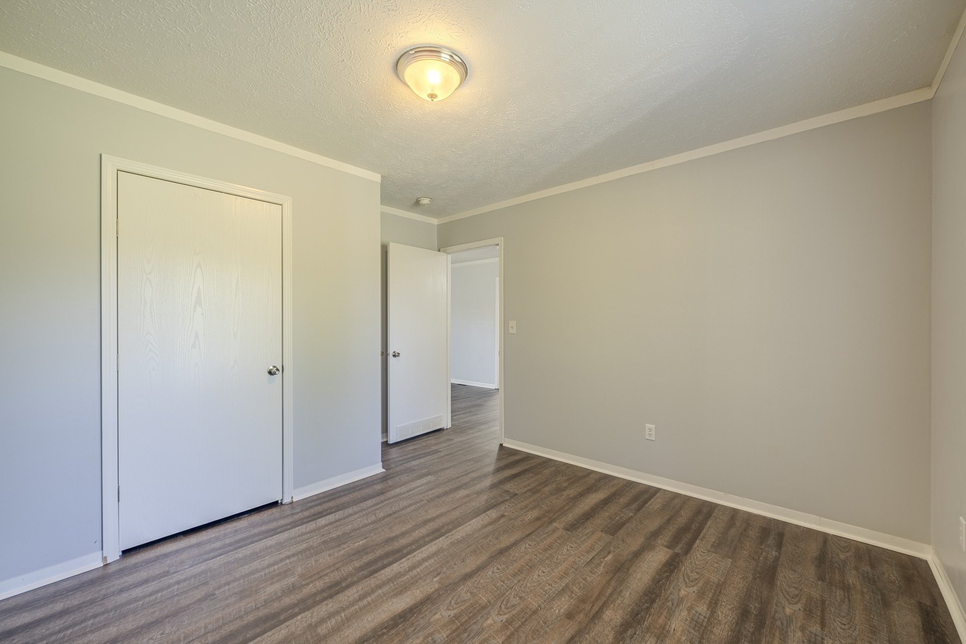 1125 Clifft Road Bolivar, TN 38008 - Photo 37 of 78 a view of an empty room with wooden floor