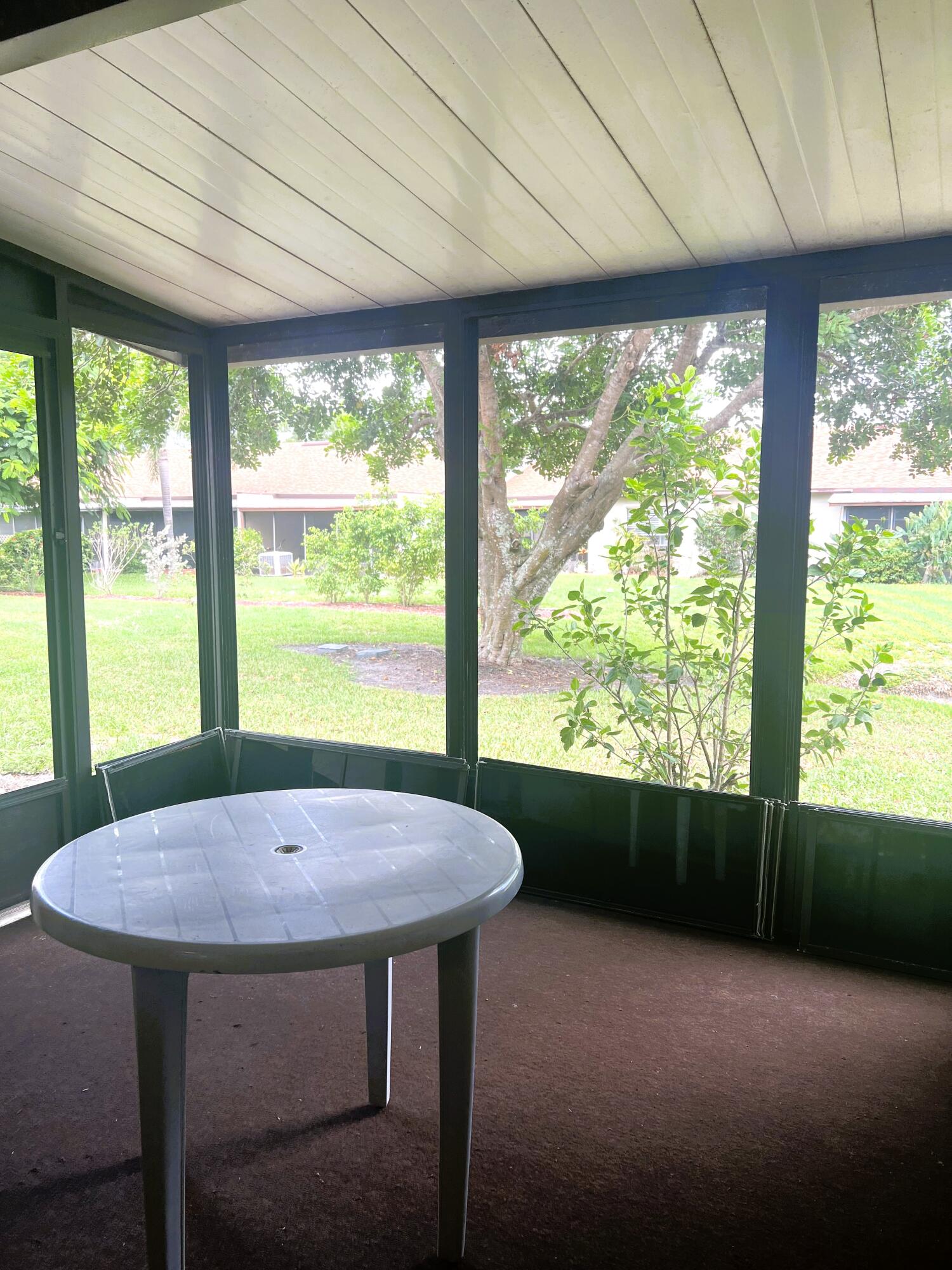 6032 Indrio Road, Unit 8 Fort Pierce, FL 34951 - Photo 14 of 26 Screened patio