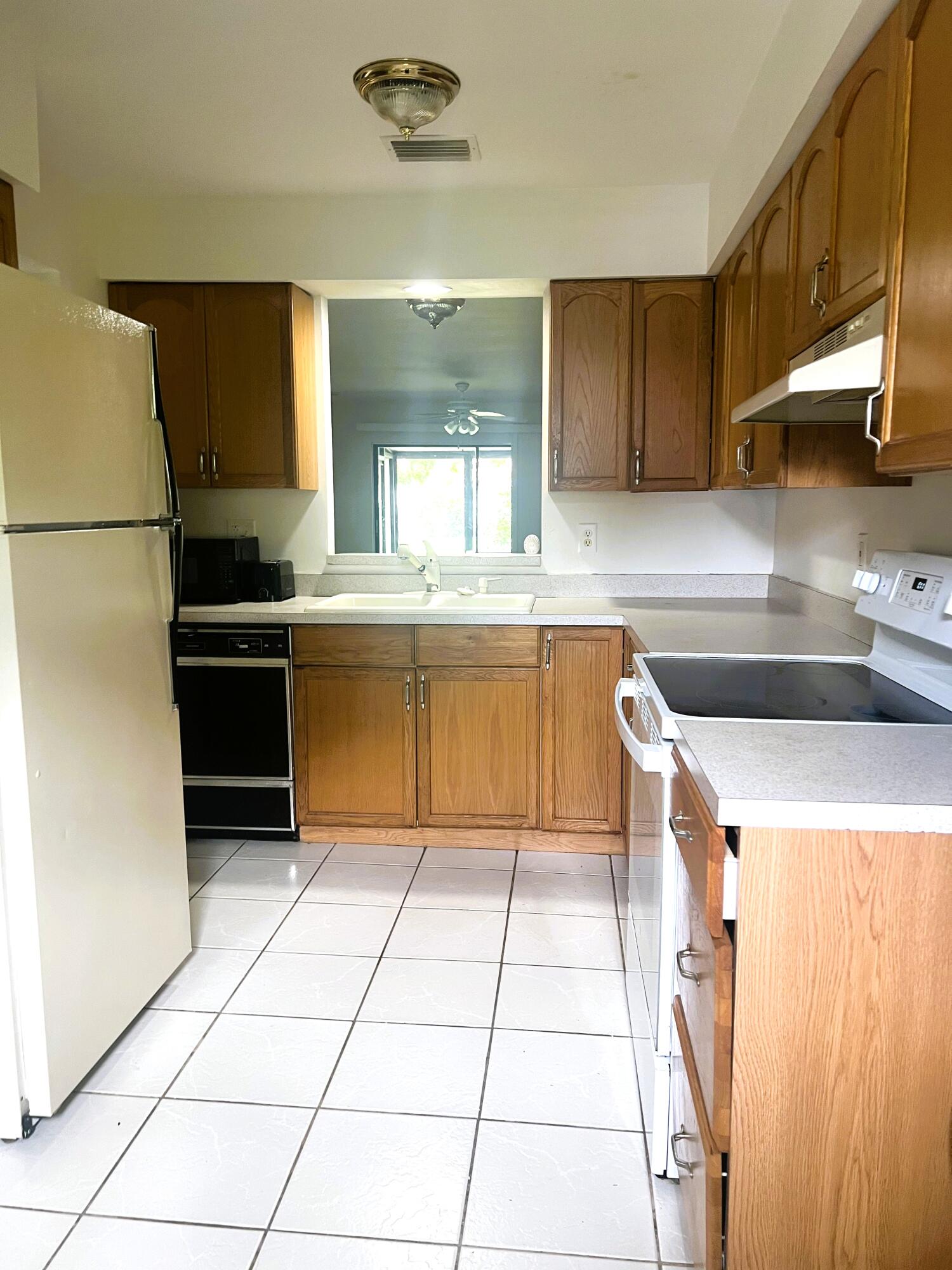 6032 Indrio Road, Unit 8 Fort Pierce, FL 34951 - Photo 4 of 26 Kitchen