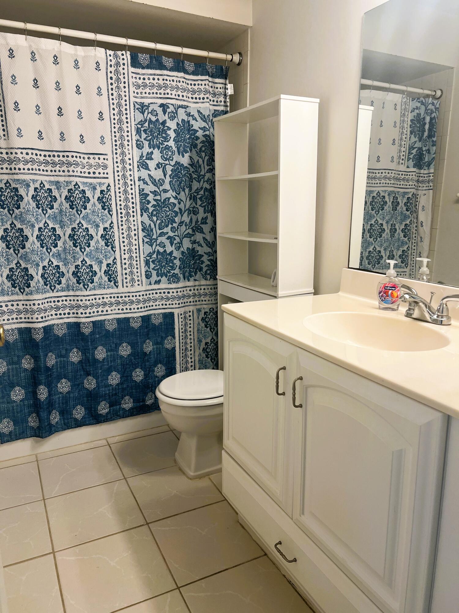6032 Indrio Road, Unit 8 Fort Pierce, FL 34951 - Photo 7 of 26 Guest bathroom