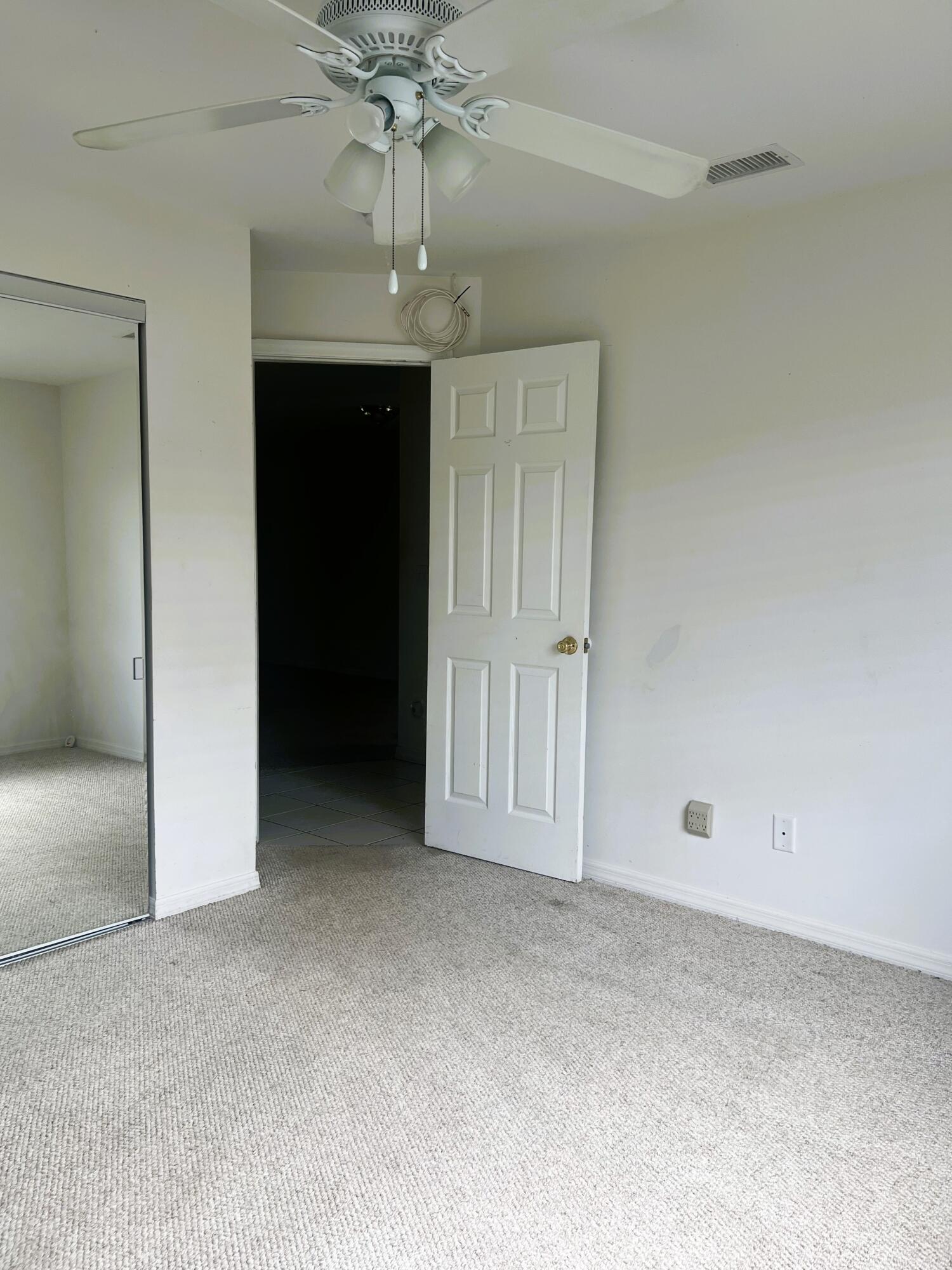 6032 Indrio Road, Unit 8 Fort Pierce, FL 34951 - Photo 9 of 26 Primary bedroom