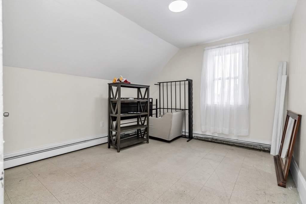 70 Butler Street Lawrence, MA 01841 - Photo 13 of 19 an empty room with windows