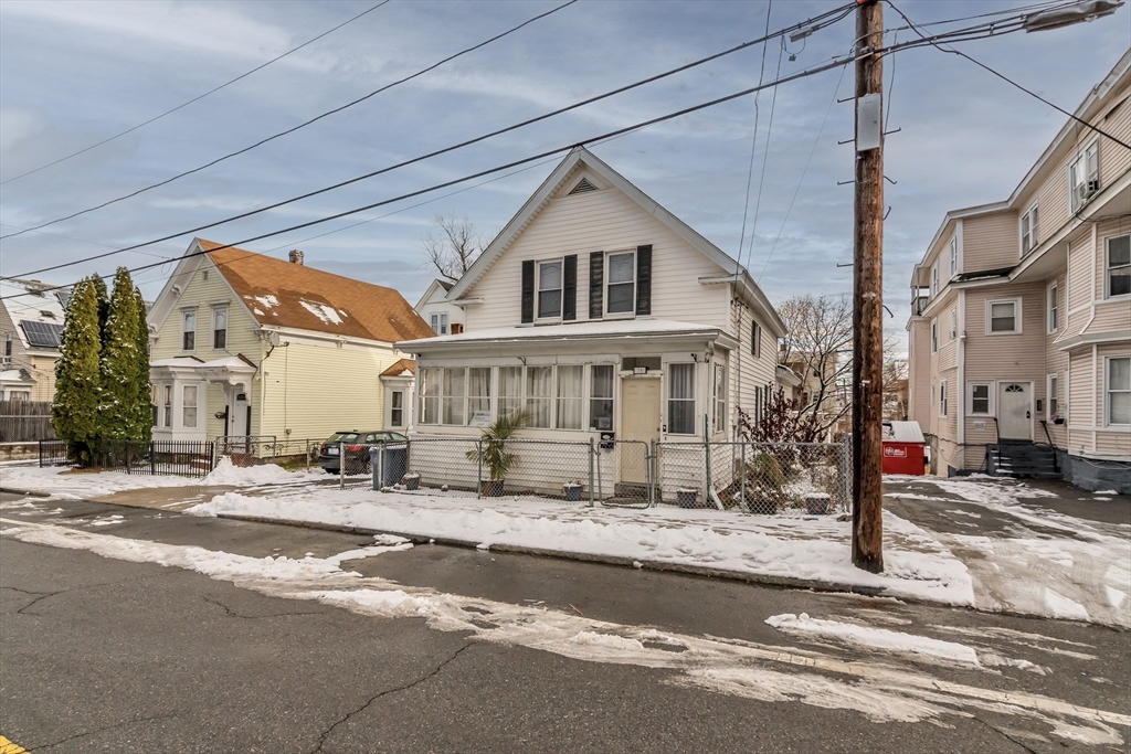 70 Butler Street Lawrence, MA 01841 - Photo 2 of 19 a view of a house with a outdoor space