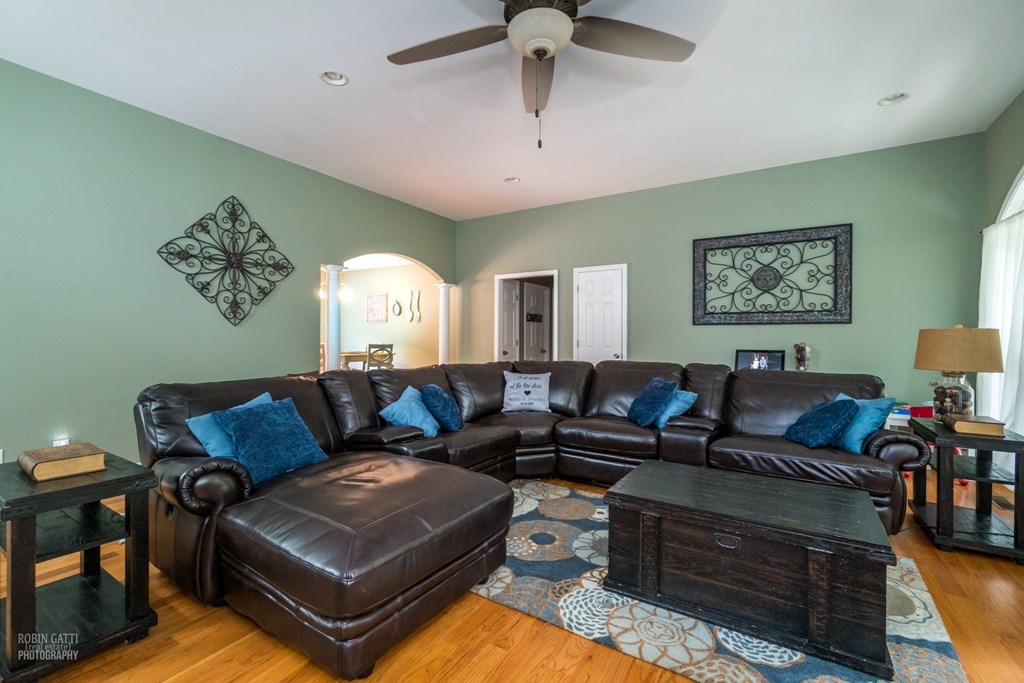 121 Gordon Road Gray, GA 31032 - Photo 5 of 32 a living room with furniture and a chandelier