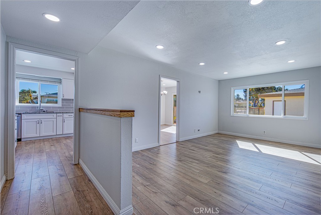 1480 East Colver Place Covina, CA 91724 - Photo 11 of 31 a view of an empty room with wooden floor and a window