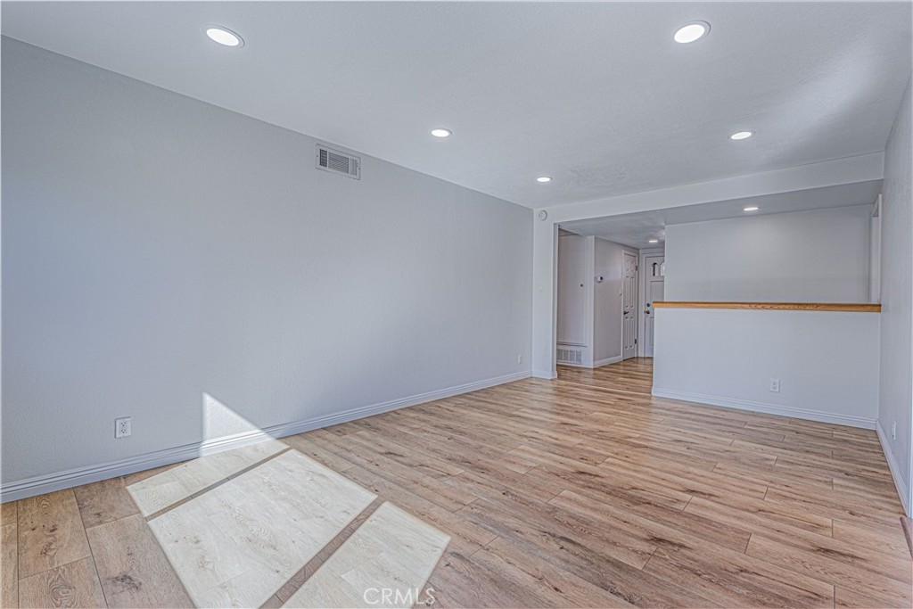 1480 East Colver Place Covina, CA 91724 - Photo 13 of 31 a view of an empty room with wooden floor