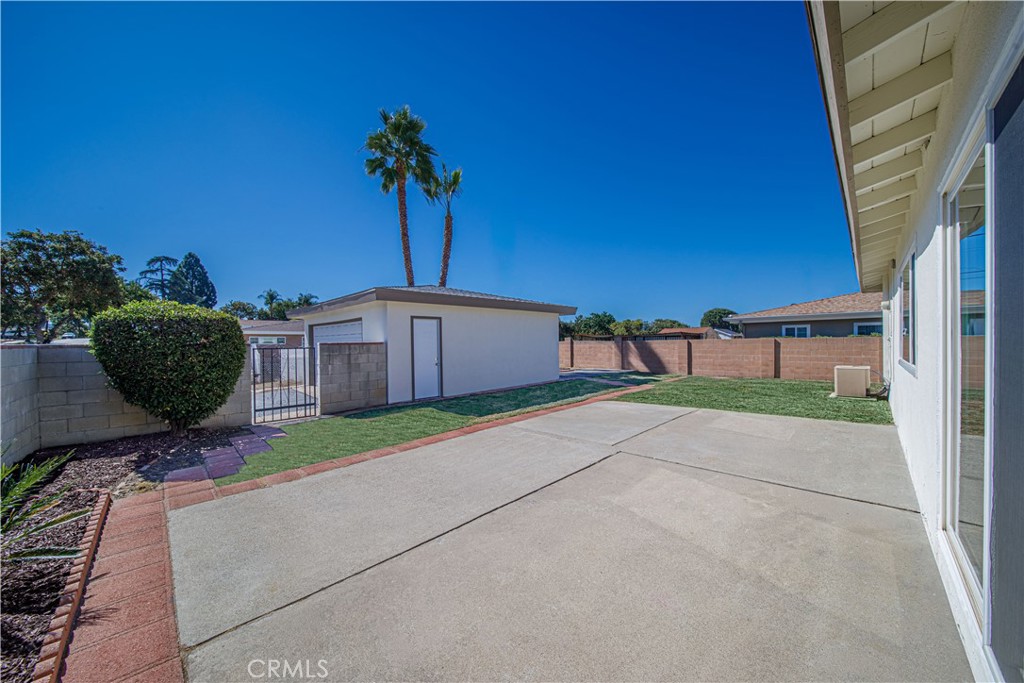 1480 East Colver Place Covina, CA 91724 - Photo 5 of 31 a view of backyard with seating space and potted plants