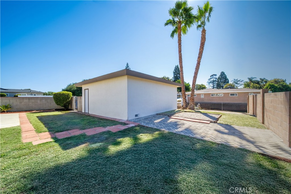 1480 East Colver Place Covina, CA 91724 - Photo 7 of 31 a view of backyard of house and car parked
