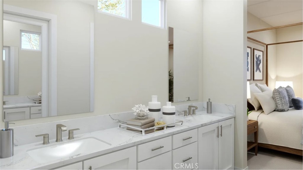 1397 Gavilan Ridge Rancho Mission Viejo, CA 92694 - Photo 11 of 22 a en suite bathroom with a double vanity sink and a mirror