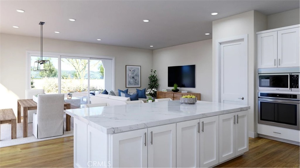 1397 Gavilan Ridge Rancho Mission Viejo, CA 92694 - Photo 2 of 22 a kitchen with stainless steel appliances granite countertop a sink a stove and a refrigerator