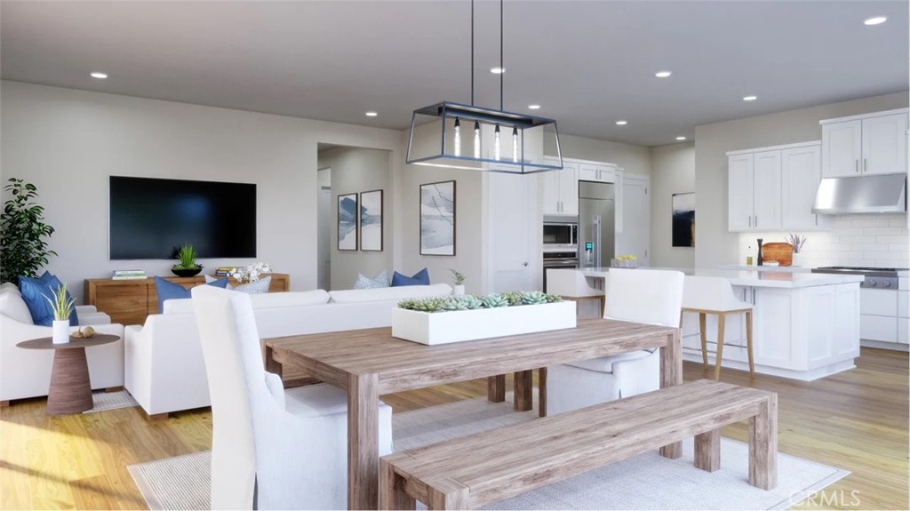 1397 Gavilan Ridge Rancho Mission Viejo, CA 92694 - Photo 4 of 22 a living room with fireplace furniture and a flat screen tv