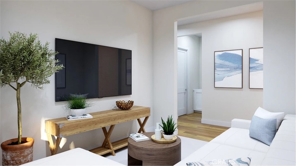 1397 Gavilan Ridge Rancho Mission Viejo, CA 92694 - Photo 8 of 22 a living room with furniture and a potted plant