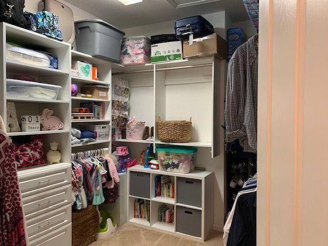 271 Southwest Walking Path Stuart, FL 34997 - Photo 20 of 35 a view of walk in closet with clothes and shoes