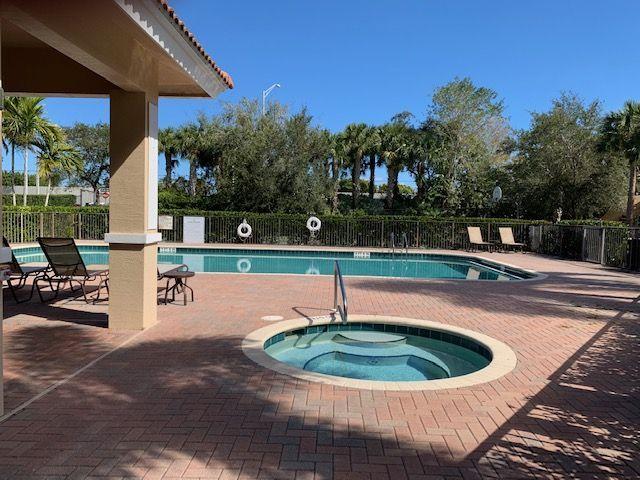271 Southwest Walking Path Stuart, FL 34997 - Photo 31 of 35 a view of a swimming pool with a patio