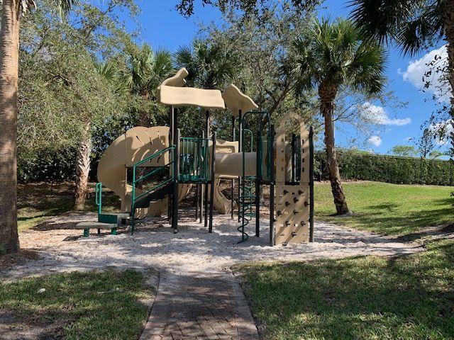 271 Southwest Walking Path Stuart, FL 34997 - Photo 32 of 35 a view of a park with slide