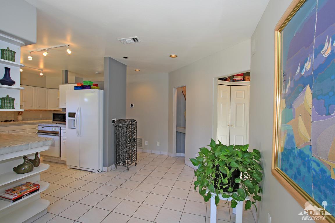 71471 Halgar Road Rancho Mirage, CA 92270 - Photo 23 of 49 a room with patio outer and glass door