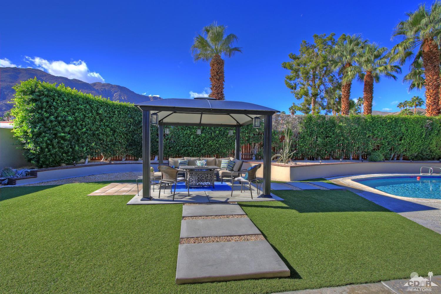 71471 Halgar Road Rancho Mirage, CA 92270 - Photo 35 of 49 a view of a backyard with swimming pool