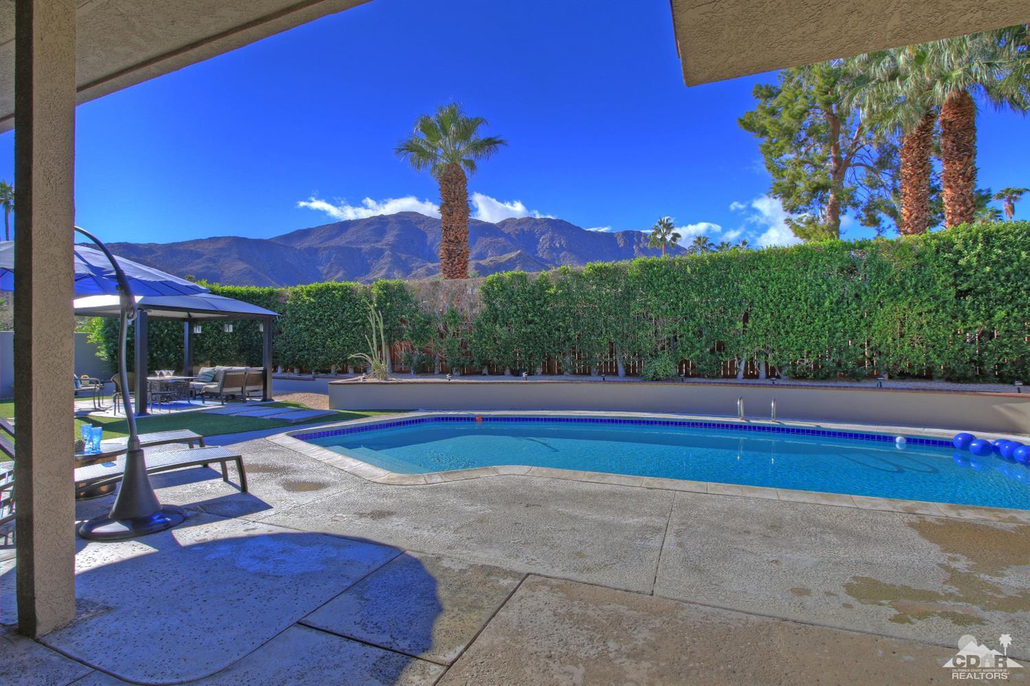 71471 Halgar Road Rancho Mirage, CA 92270 - Photo 37 of 49 a view of swimming pool with outdoor seating and a patio