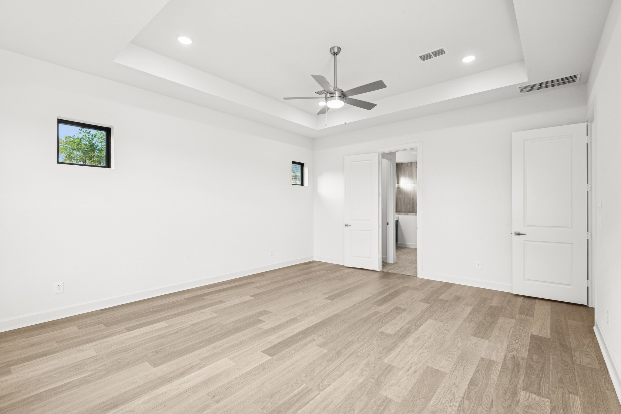 15748 Terracotta Terrace Lane Conroe, TX 77302 - Photo 39 of 50 wooden floor in an empty room