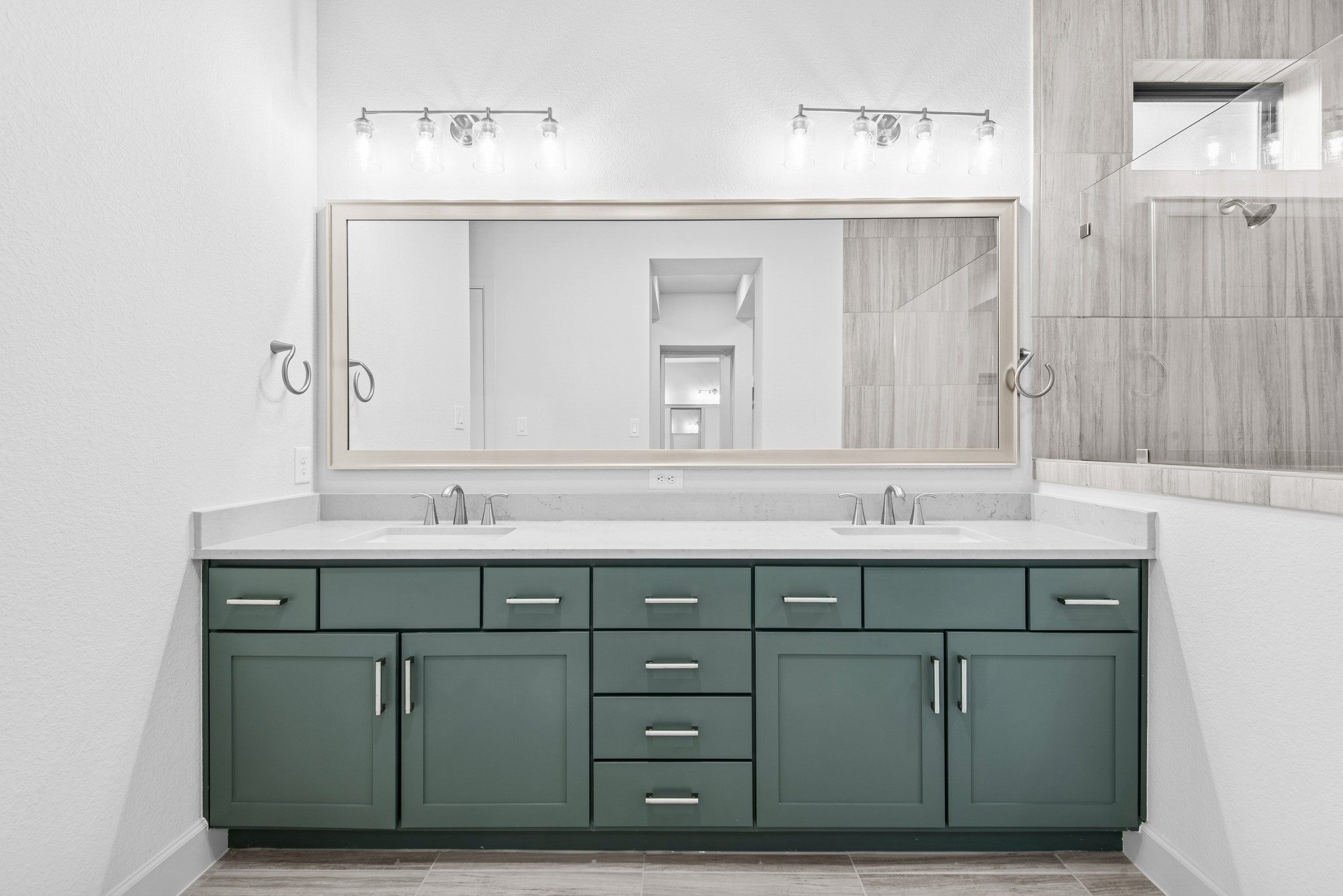 15748 Terracotta Terrace Lane Conroe, TX 77302 - Photo 42 of 50 a bathroom with a sink vanity and a mirror