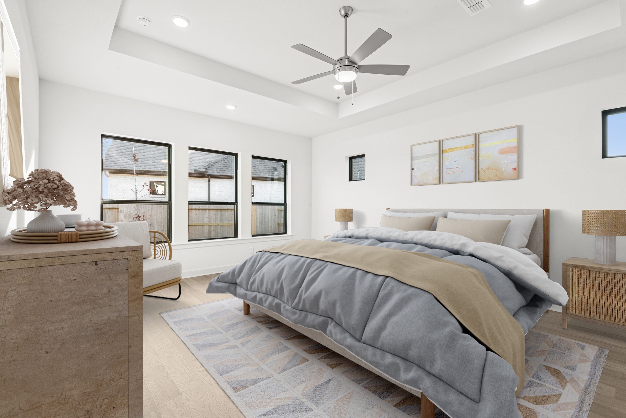 15748 Terracotta Terrace Lane Conroe, TX 77302 - Photo 5 of 50 a spacious bedroom with a large bed and a chandelier