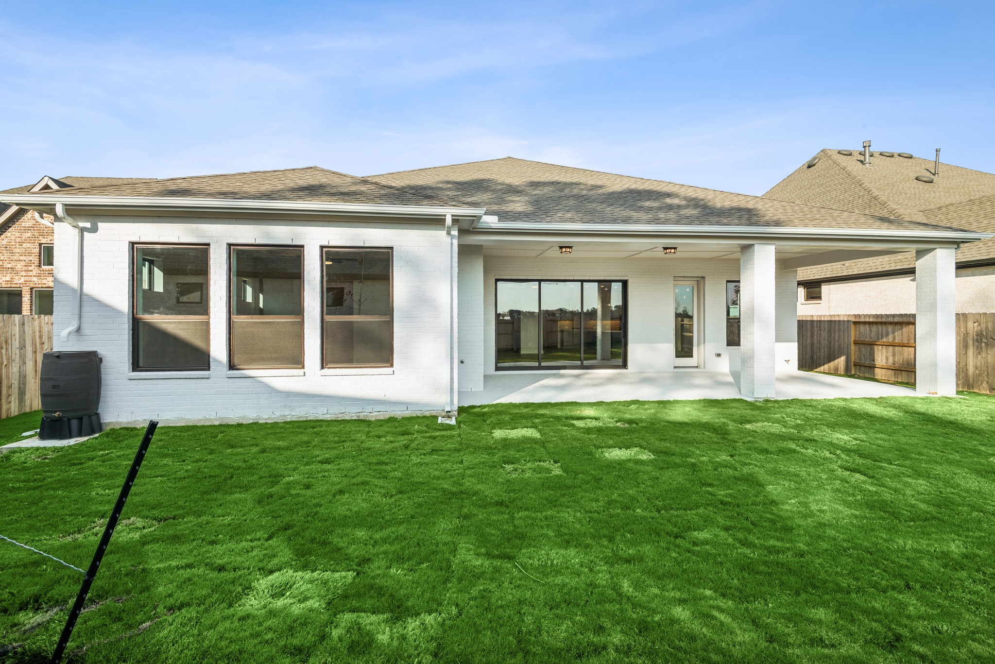 15748 Terracotta Terrace Lane Conroe, TX 77302 - Photo 8 of 50 front view of a house with a yard
