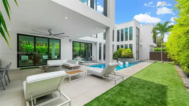 a house view with a sitting space and garden space