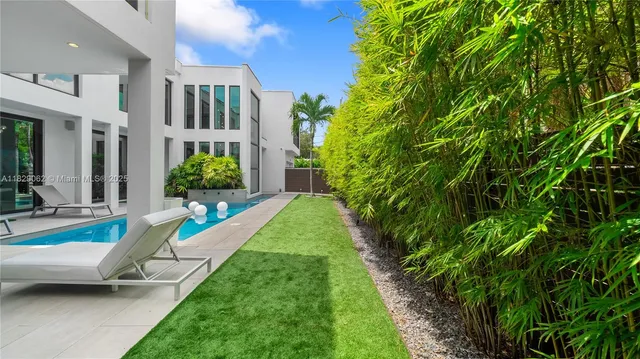 a view of entryway with furniture and floor to ceiling window