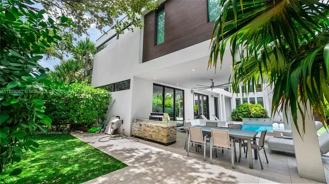 a lobby with furniture and floor to ceiling window