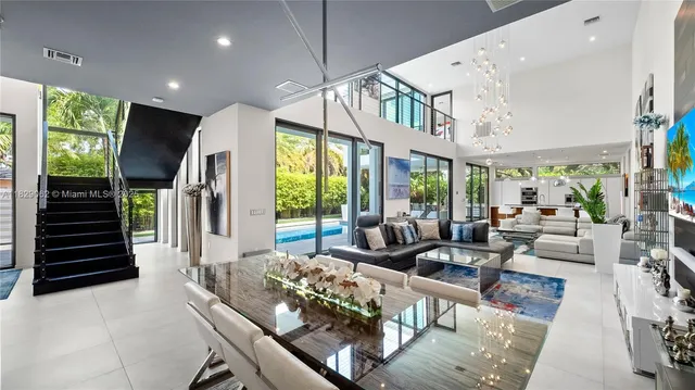 a bedroom with a large bed and a rug