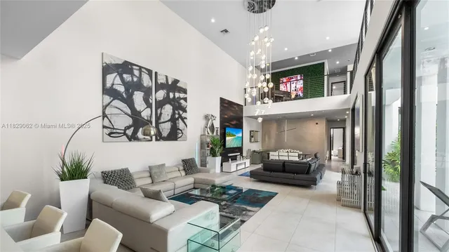 a view of a projector room with furniture and wooden floor