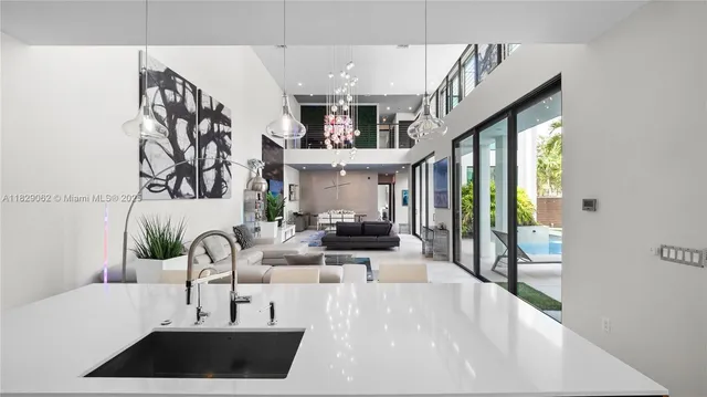 a bed room with a bed and a large window