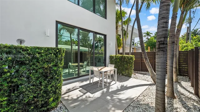 a bathroom with a toilet a sink and a mirror