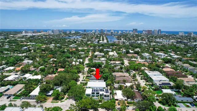 a view of a house with a yard and entertaining space