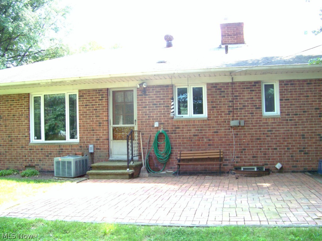 5491 Roy Road Cleveland, OH 44143 - Photo 5 of 19 Back brick patio off Kitchen