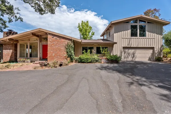 a front view of house with yard