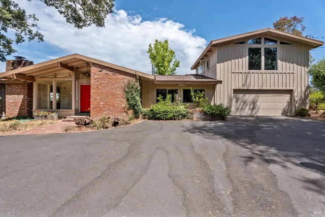 a front view of house with yard