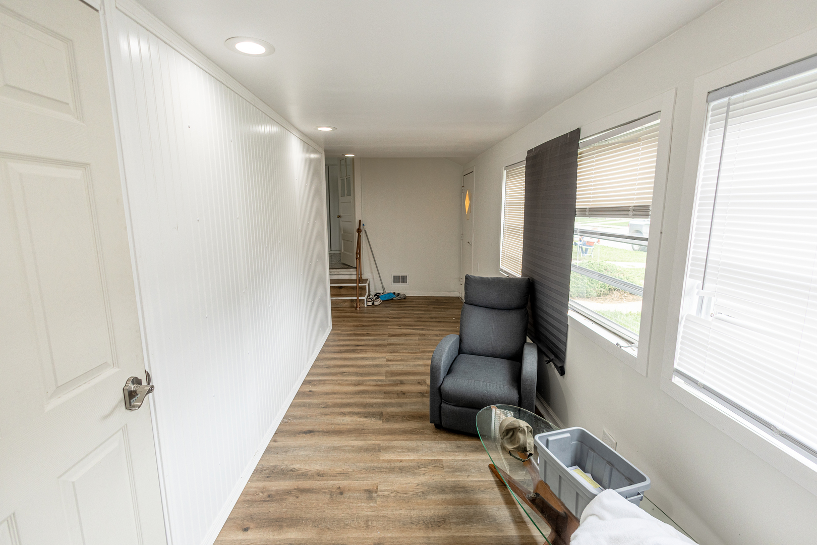 4422 Custer Avenue Brookfield, IL 60513 - Photo 14 of 22 a hallway with a couch and a window