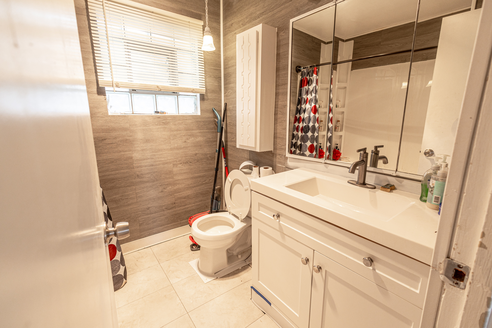 4422 Custer Avenue Brookfield, IL 60513 - Photo 18 of 22 a bathroom with a sink toilet and shower