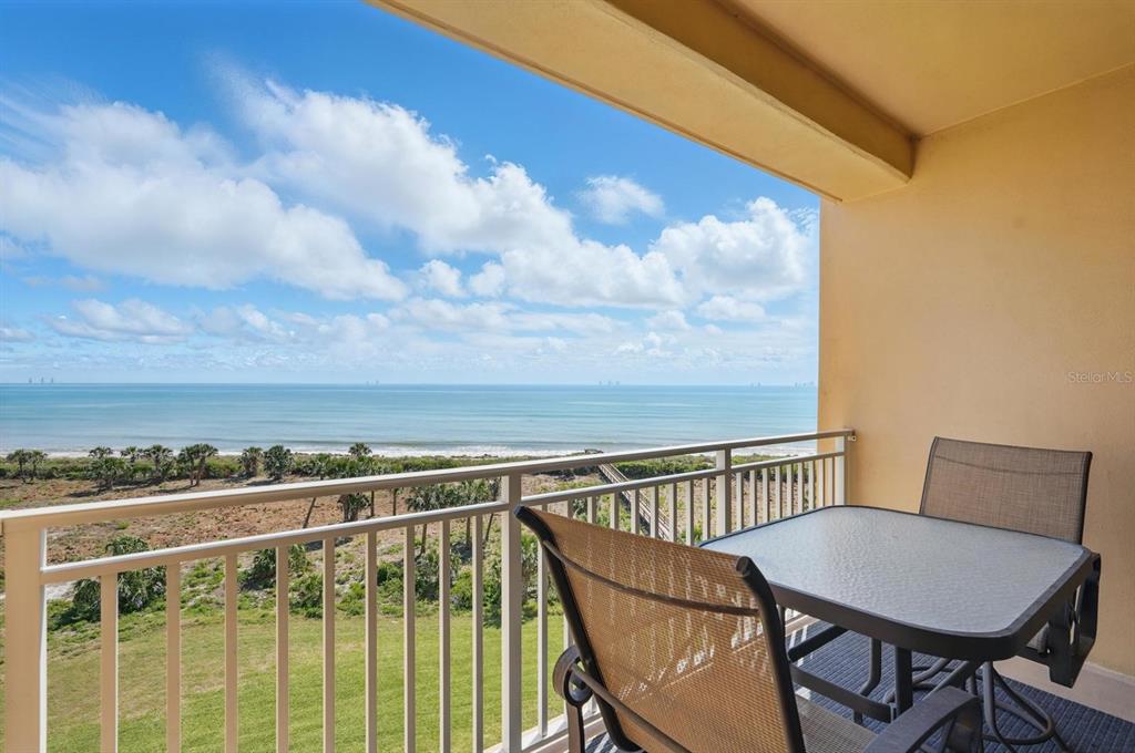 80 Surfview Drive, Unit 511 Palm Coast, FL 32137 - Photo 17 of 25 a view of a balcony with chairs