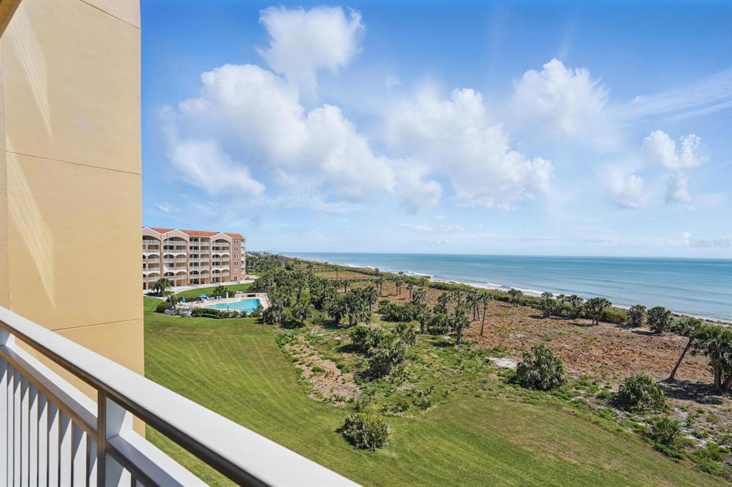 80 Surfview Drive, Unit 511 Palm Coast, FL 32137 - Photo 18 of 25 a view of building with ocean view