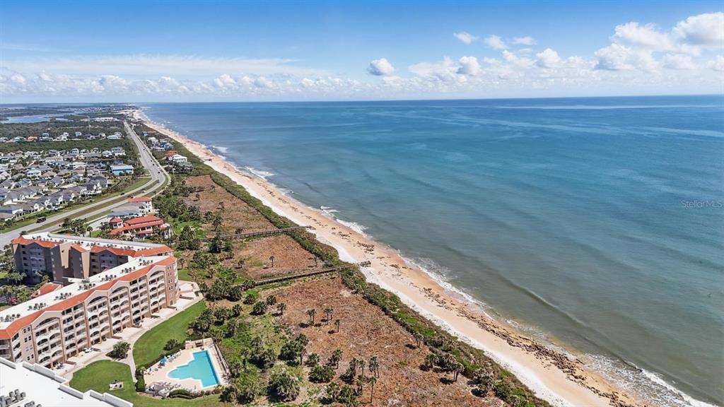 80 Surfview Drive, Unit 511 Palm Coast, FL 32137 - Photo 19 of 25 a view of water heater room with wooden floor