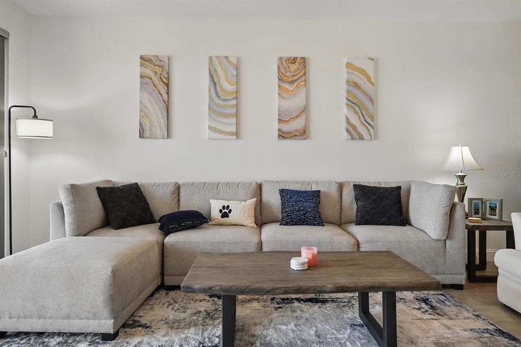 80 Surfview Drive, Unit 511 Palm Coast, FL 32137 - Photo 9 of 25 a living room with furniture