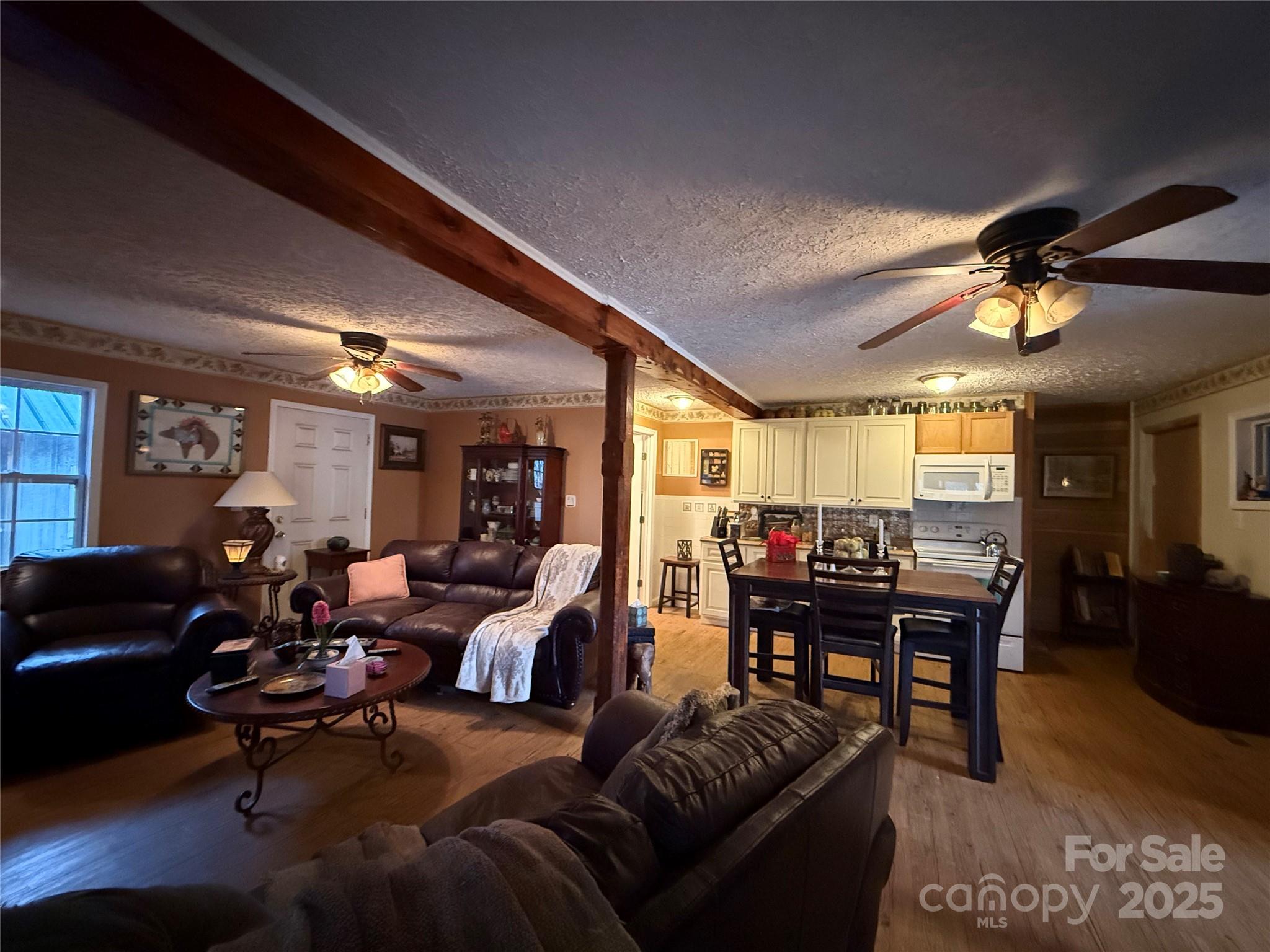 201 Mountain Vista Road Canton, NC 28716 - Photo 11 of 21 a living room with furniture and a large window