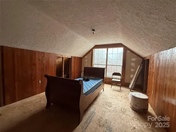 a living room with furniture and a gate