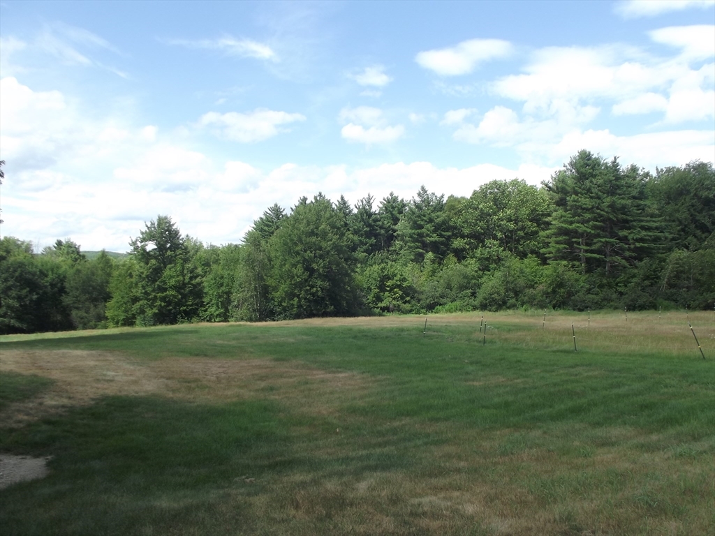 123 Willard Road Ashburnham, MA 01430 - Photo 2 of 15 a view of grassy field with trees