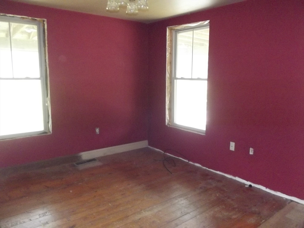 123 Willard Road Ashburnham, MA 01430 - Photo 7 of 15 an empty room with a window