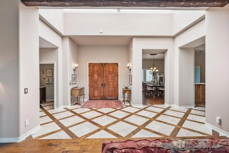 14370 Harvest Crescent Poway, CA 92064 - Photo 13 of 56 a bedroom with a bed and a mirror